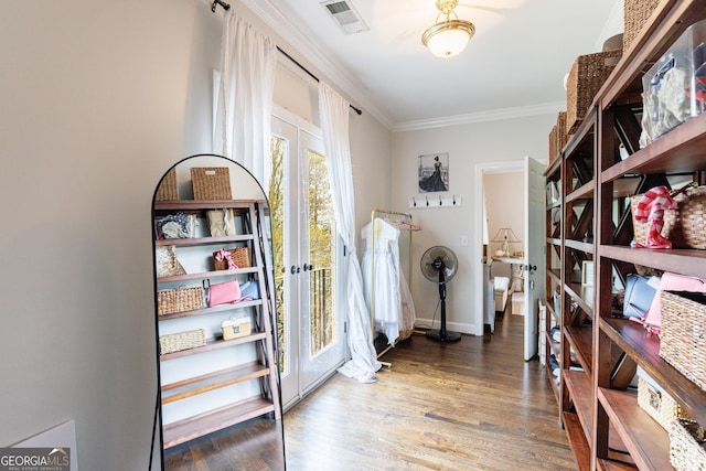 2005 Westbourne Way, Alpharetta, GA 30022 - laundry room with ornamental molding, wood finished floors, and baseboards