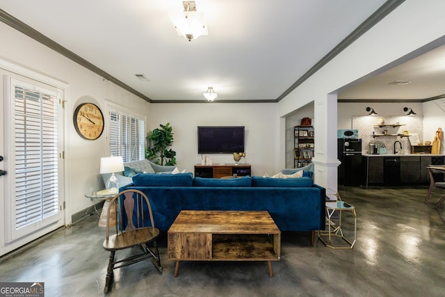 2005 Westbourne Way, Alpharetta, GA 30022 - living area featuring finished concrete floors and crown molding