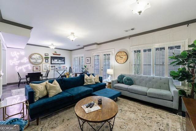2005 Westbourne Way, Alpharetta, GA 30022 - living area with ornamental molding, french doors, healthy amount of natural light, and baseboards