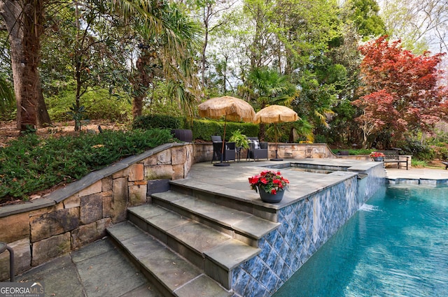2005 Westbourne Way, Alpharetta, GA 30022 - view of pool featuring a pool with connected hot tub and a patio area