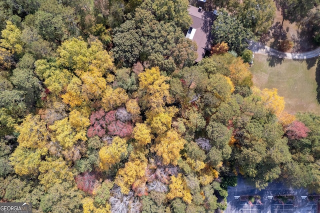 aerial view featuring a view of trees