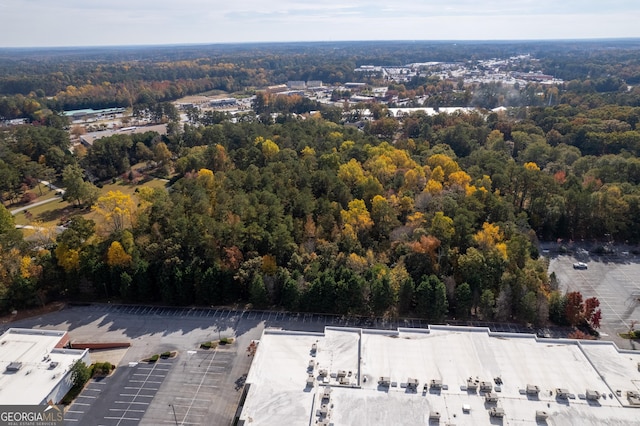 bird's eye view featuring a forest view
