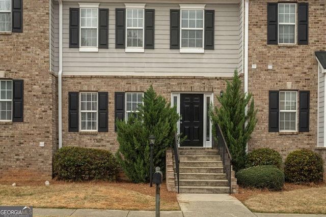 view of front facade with brick siding