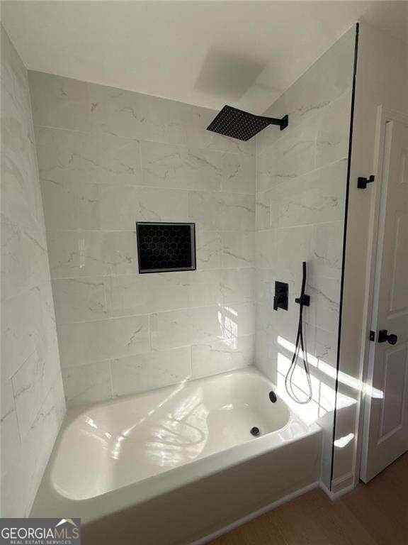 bathroom featuring tub / shower combination