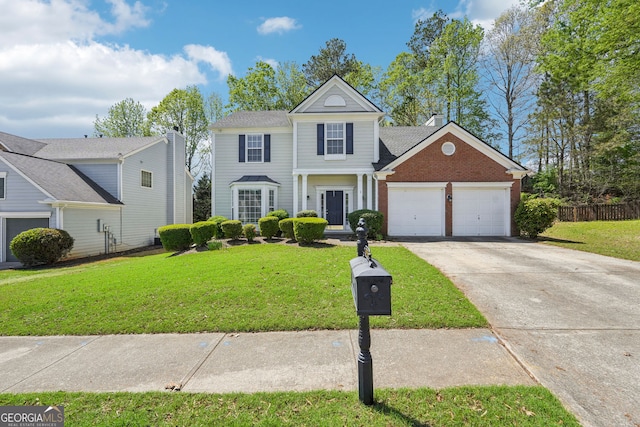 3936 Toccoa Falls Dr, Duluth, GA 30097 - traditional home featuring a garage, driveway, brick siding, and a chimney