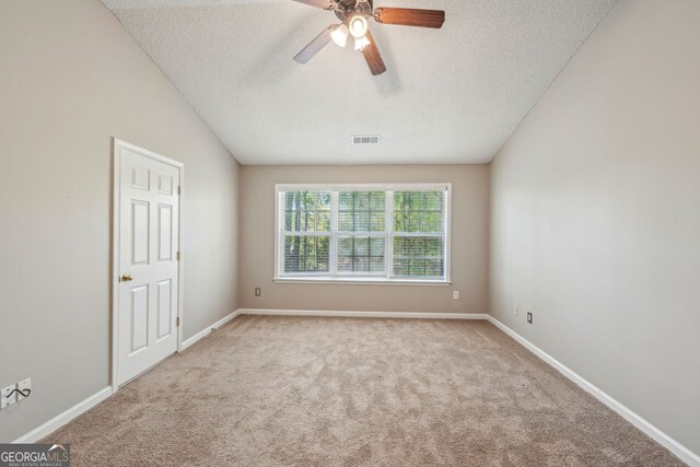 3936 Toccoa Falls Dr, Duluth, GA 30097 - carpeted empty room featuring a textured ceiling, a ceiling fan, and baseboards