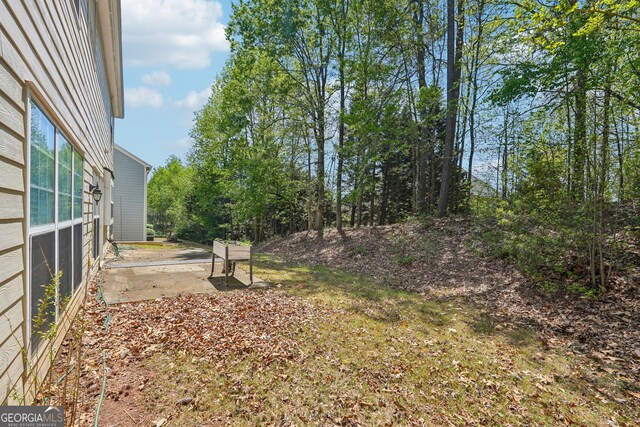 3936 Toccoa Falls Dr, Duluth, GA 30097 - view of yard featuring a patio area