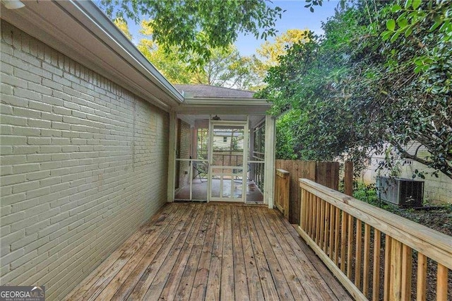 656 Channing Dr NW, Atlanta, GA 30318 - wooden deck featuring a sunroom