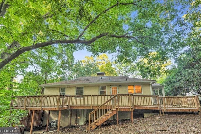 656 Channing Dr NW, Atlanta, GA 30318 - rear view of house with a deck and stairway