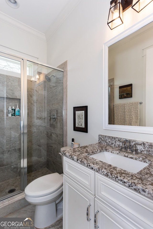 1515 Walker Ave, College Park, GA 30337 - full bathroom with vanity, ornamental molding, a shower stall, and toilet