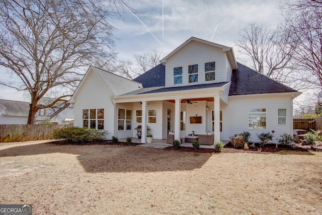 1515 Walker Ave, College Park, GA 30337 - view of front of property featuring a ceiling fan, roof with shingles, and a porch