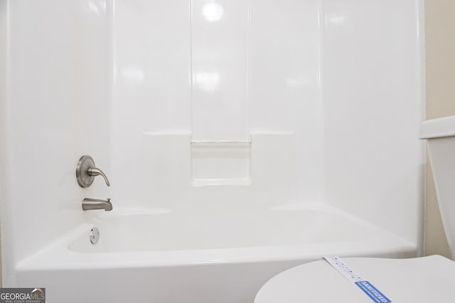 bathroom featuring toilet