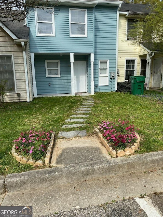 exterior space with a yard