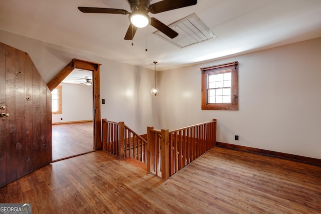 1621 Daniells Bridge Rd, Athens, GA 30606 - hallway with an upstairs landing, wood finished floors, attic access, and baseboards