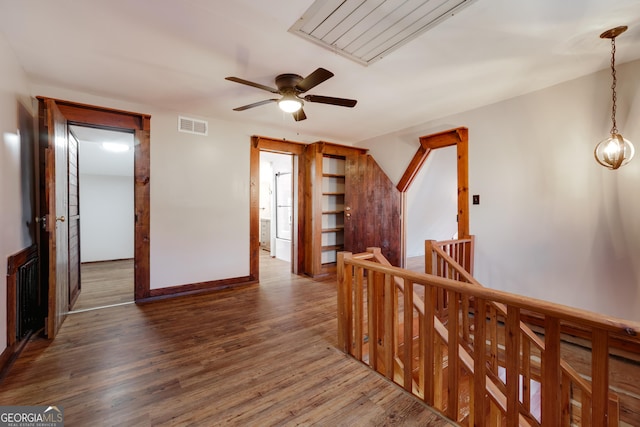 1621 Daniells Bridge Rd, Athens, GA 30606 - hall featuring an upstairs landing, attic access, wood finished floors, and baseboards