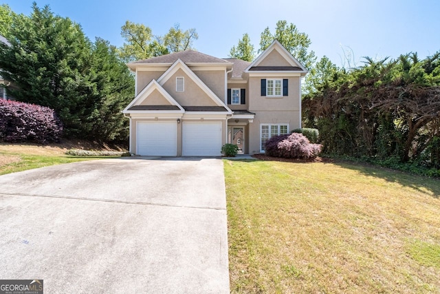 traditional-style house featuring an attached garage, driveway, a front yard, and stucco siding