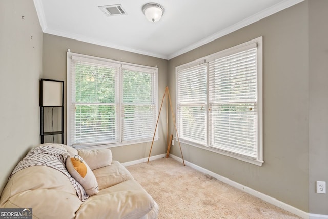 living area with carpet, visible vents, crown molding, and baseboards