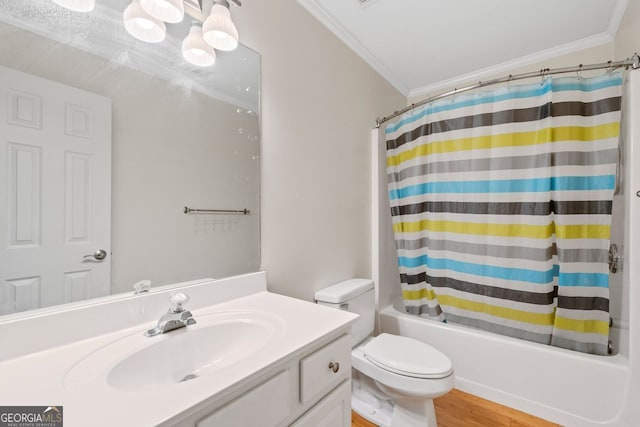 bathroom with shower / bath combo, toilet, crown molding, and vanity