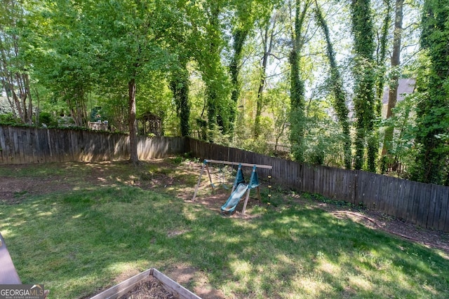 view of yard featuring a fenced backyard