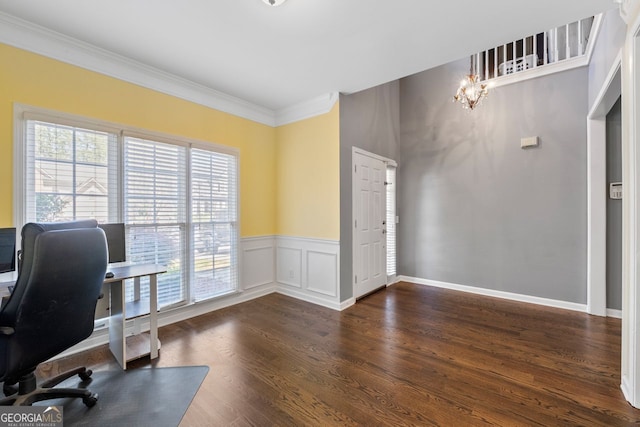 office area featuring a healthy amount of sunlight, dark wood-style floors, ornamental molding, and an inviting chandelier