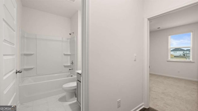 1099 Blue Juniper Cir, Loganville, GA 30052 - full bathroom with toilet, vanity, shower / washtub combination, marble finish floor, and baseboards