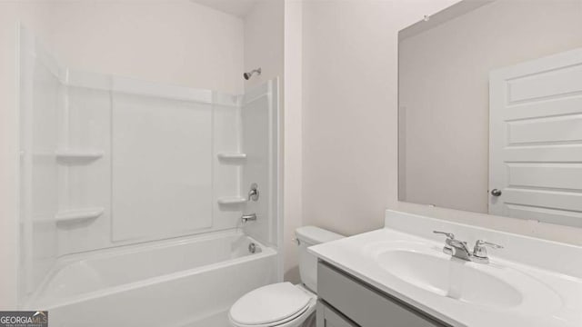 1099 Blue Juniper Cir, Loganville, GA 30052 - bathroom featuring  shower combination, toilet, and vanity