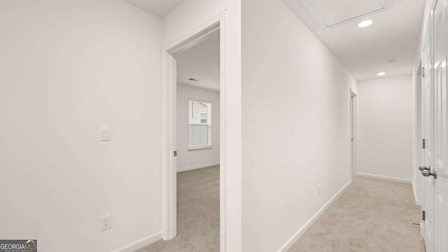 1099 Blue Juniper Cir, Loganville, GA 30052 - hallway with baseboards, light colored carpet, and recessed lighting
