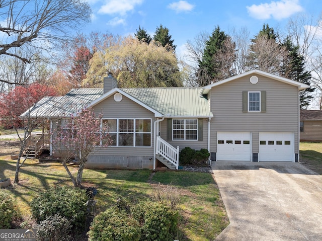 1595 Historic Old Highway 441, Clarkesville, GA 30523 - view of front of property featuring concrete driveway, a chimney, an attached garage, a front yard, and a metal roof