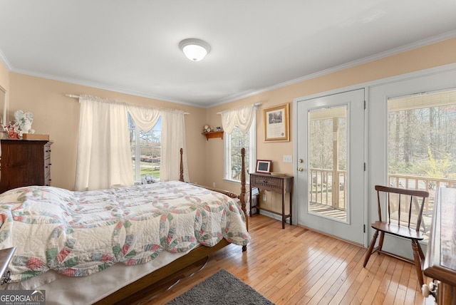 1595 Historic Old Highway 441, Clarkesville, GA 30523 - bedroom featuring access to exterior, wood-type flooring, and crown molding
