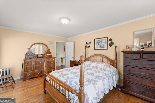 1595 Historic Old Highway 441, Clarkesville, GA 30523 - bedroom with ornamental molding, light wood-type flooring, and radiator