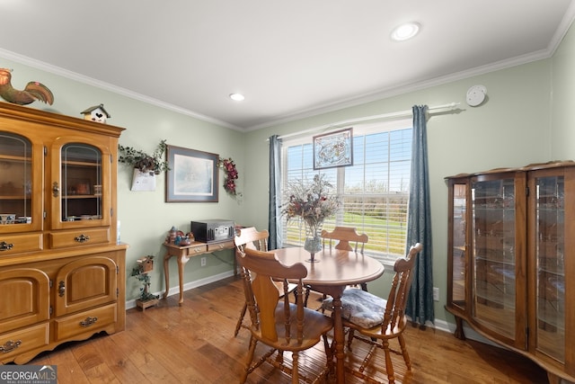 1595 Historic Old Highway 441, Clarkesville, GA 30523 - dining area featuring light wood-style floors, ornamental molding, and recessed lighting