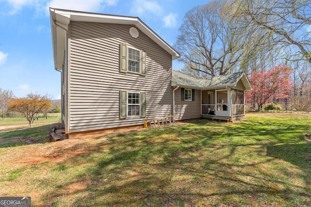1595 Historic Old Highway 441, Clarkesville, GA 30523 - rear view of property featuring a yard and a sunroom