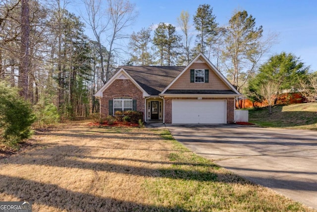 8166 N Pine Cone Dr, Villa Rica, GA 30180 - view of front of property with driveway, a garage, and brick siding