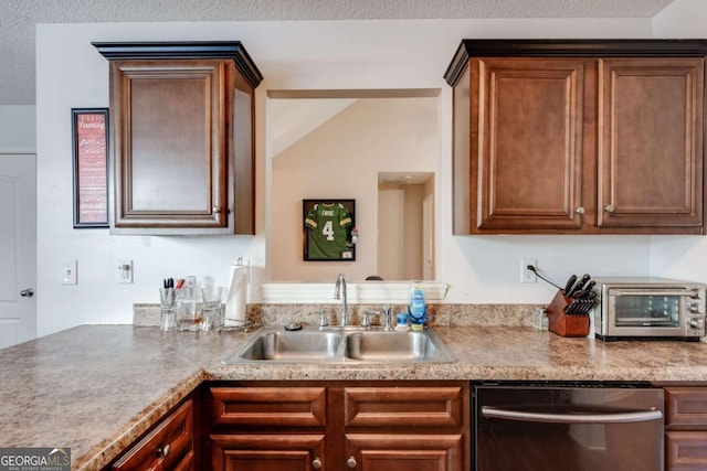 8166 N Pine Cone Dr, Villa Rica, GA 30180 - kitchen featuring light countertops, a textured ceiling, a toaster, a sink, and dishwasher