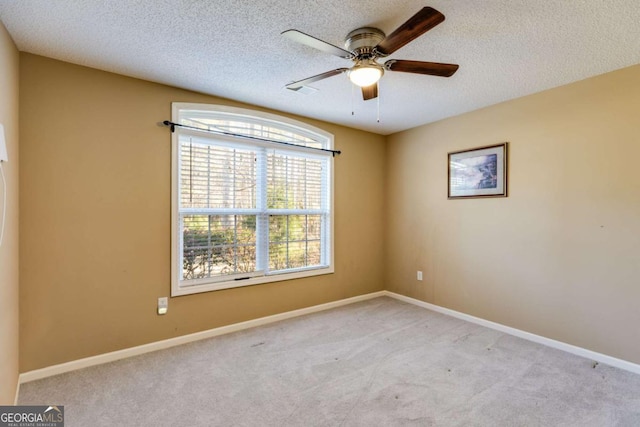 8166 N Pine Cone Dr, Villa Rica, GA 30180 - carpeted empty room featuring a ceiling fan, baseboards, and a textured ceiling