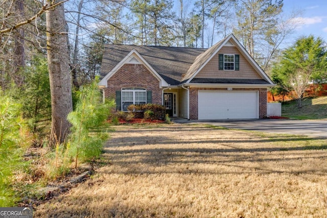 8166 N Pine Cone Dr, Villa Rica, GA 30180 - view of front of home with brick siding, a front yard, and driveway