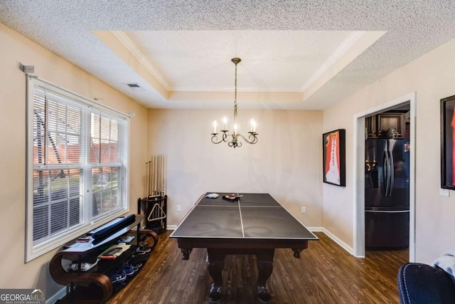 8166 N Pine Cone Dr, Villa Rica, GA 30180 - rec room featuring a textured ceiling, baseboards, a tray ceiling, and wood finished floors