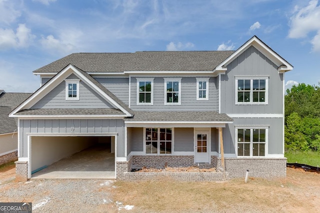 3748 Cheyenne Ln, Jefferson, GA 30549 - view of front facade with roof with shingles, dirt driveway, board and batten siding, and brick siding