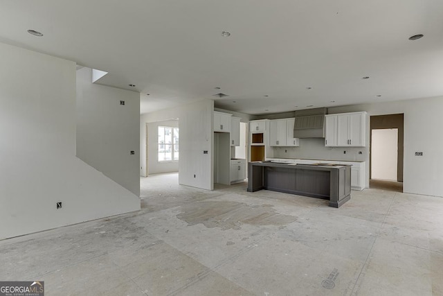3748 Cheyenne Ln, Jefferson, GA 30549 - kitchen with white cabinets and a center island