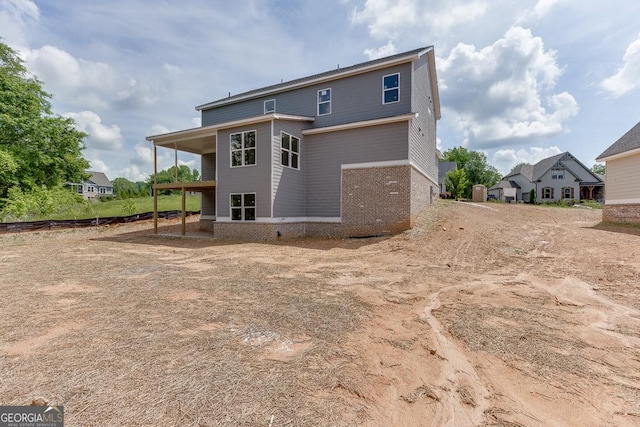 3748 Cheyenne Ln, Jefferson, GA 30549 - rear view of house featuring brick siding