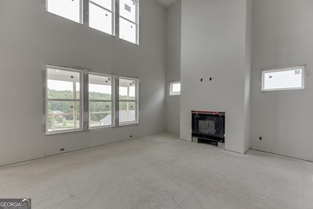 3787 Cheyenne Ln, Jefferson, GA 30549 - unfurnished living room with a towering ceiling