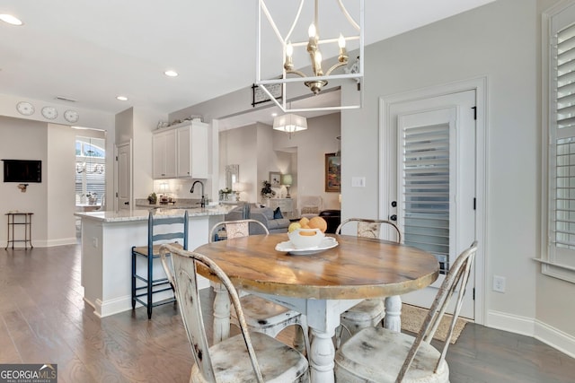 dining area featuring recessed lighting, baseboards, and dark wood-style floors