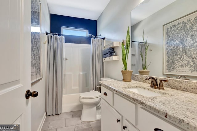 bathroom featuring toilet, tile patterned floors, shower / bath combination with curtain, and vanity