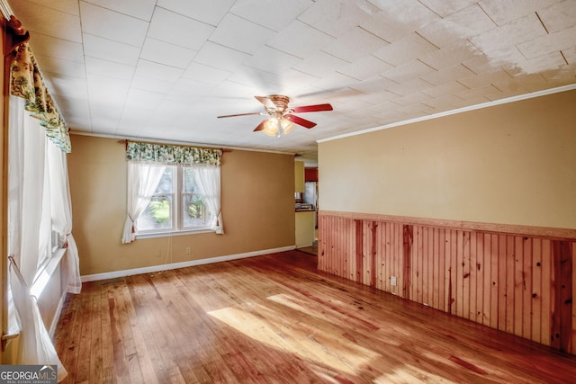 256 Black Rock Mountain Pkwy, Clayton, GA 30525 - unfurnished room with hardwood / wood-style floors, ornamental molding, and a ceiling fan