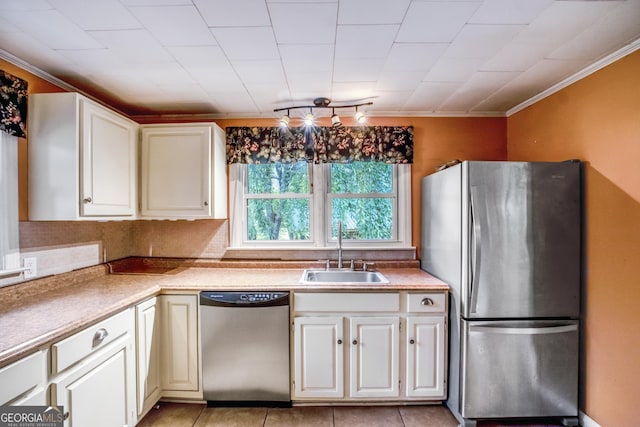 256 Black Rock Mountain Pkwy, Clayton, GA 30525 - kitchen featuring stainless steel appliances, ornamental molding, white cabinetry, light countertops, and decorative backsplash