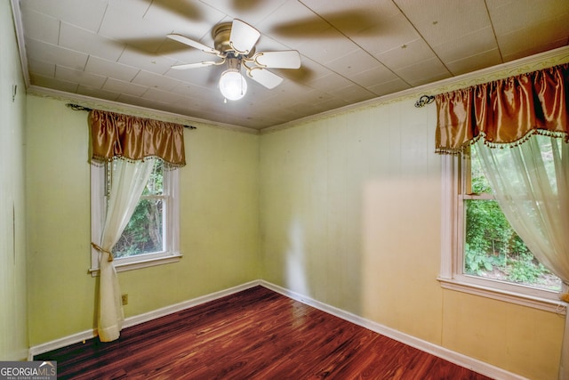 256 Black Rock Mountain Pkwy, Clayton, GA 30525 - spare room with a ceiling fan, dark wood-style floors, baseboards, and crown molding