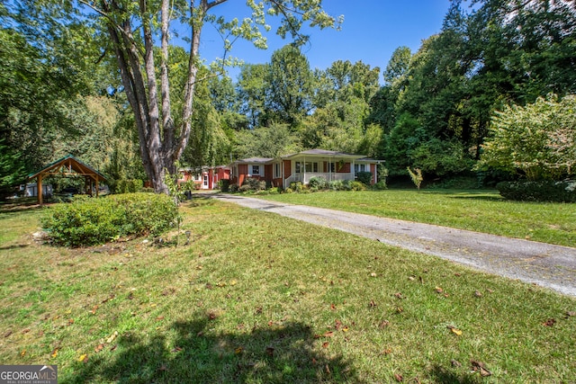 256 Black Rock Mountain Pkwy, Clayton, GA 30525 - view of front of home with a front lawn and driveway