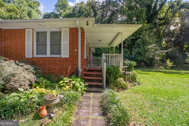 256 Black Rock Mountain Pkwy, Clayton, GA 30525 - exterior space with a porch, brick siding, and a front yard