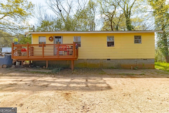 549 N Peter St, Athens, GA 30601 - view of front of house with crawl space and a wooden deck