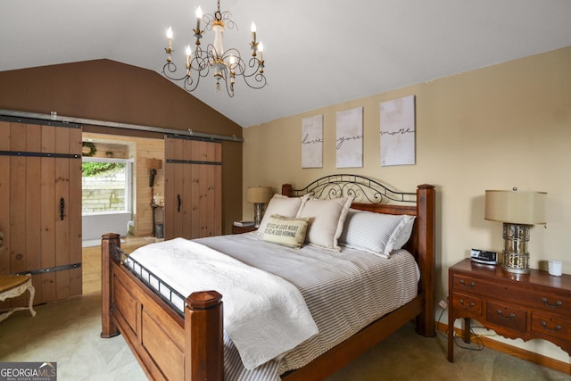 bedroom featuring light carpet, vaulted ceiling, a barn door, and an inviting chandelier